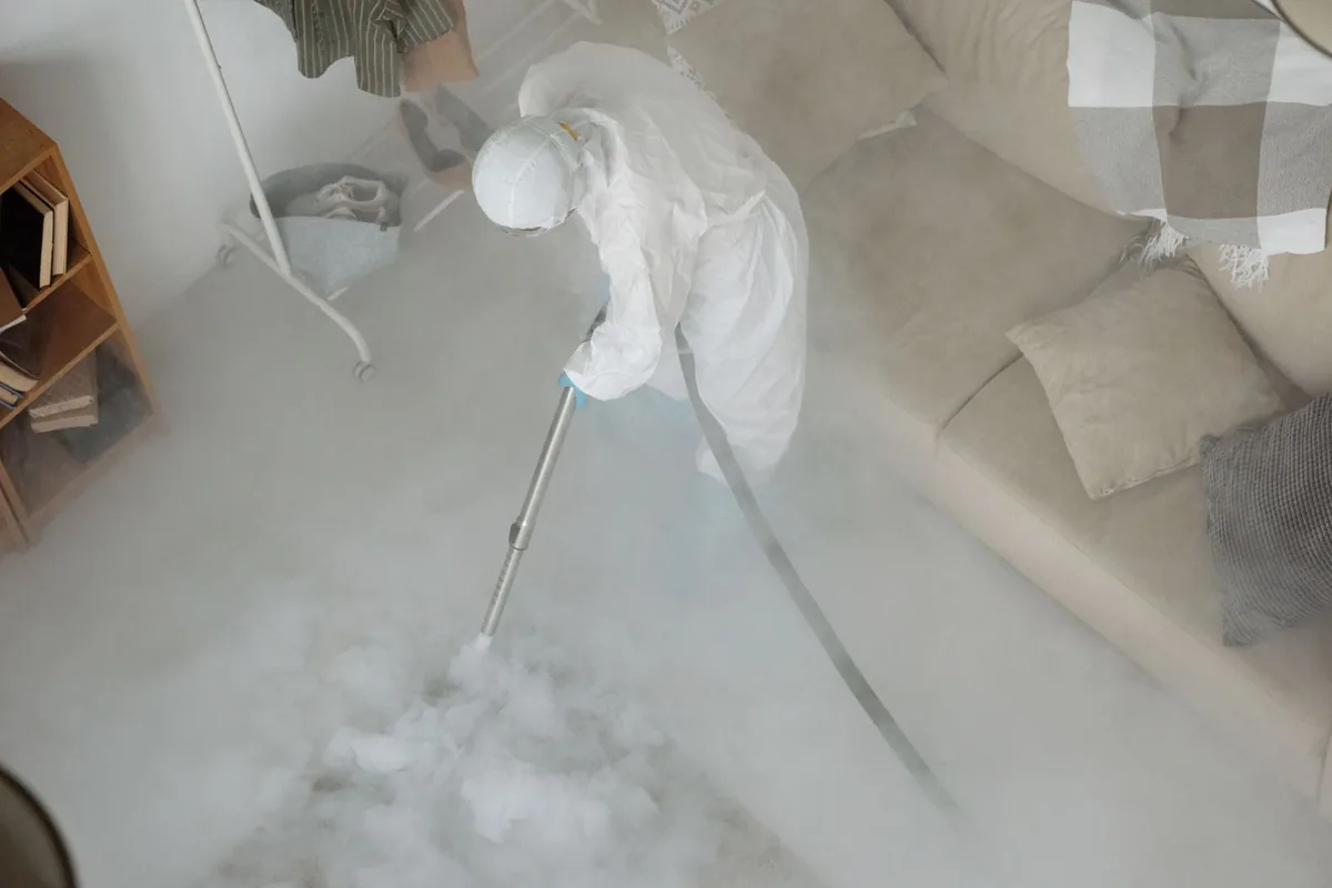 Biohazard cleanup technician in protective equipment, Moroni, UT